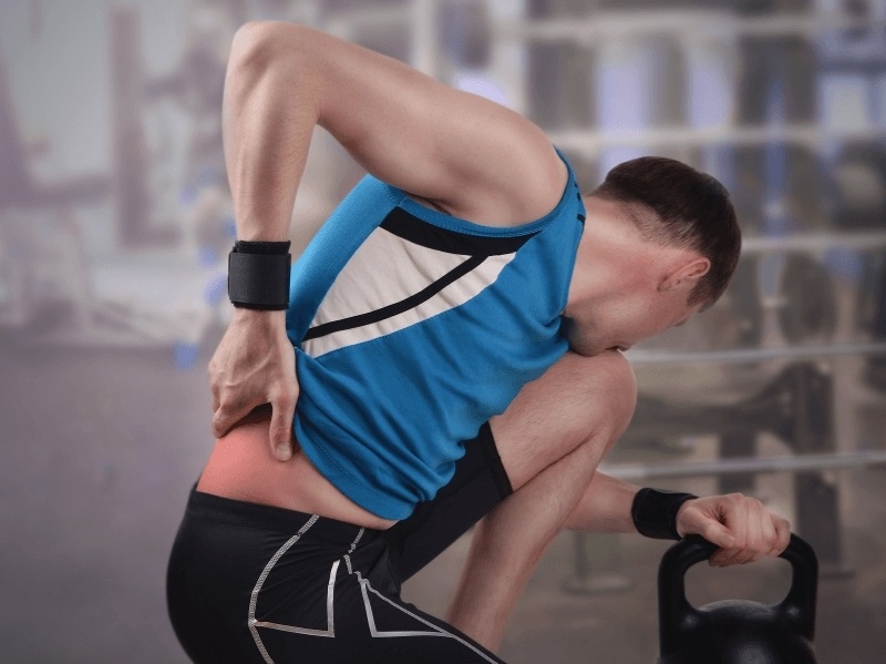 tại sao tập thể hình bị đau lưng